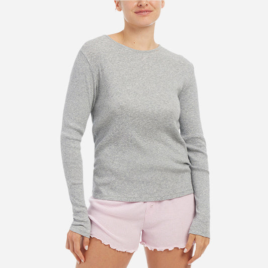 The breathable fabric ensures optimal airflow, keeping you cool and comfortable throughout the night or during cozy mornings at home. The Rayne ribbed long sleeve tee has a slim fit that features cozy details like a flattering scoop neckline, relaxed arm holes, and slightly dropped shoulders.