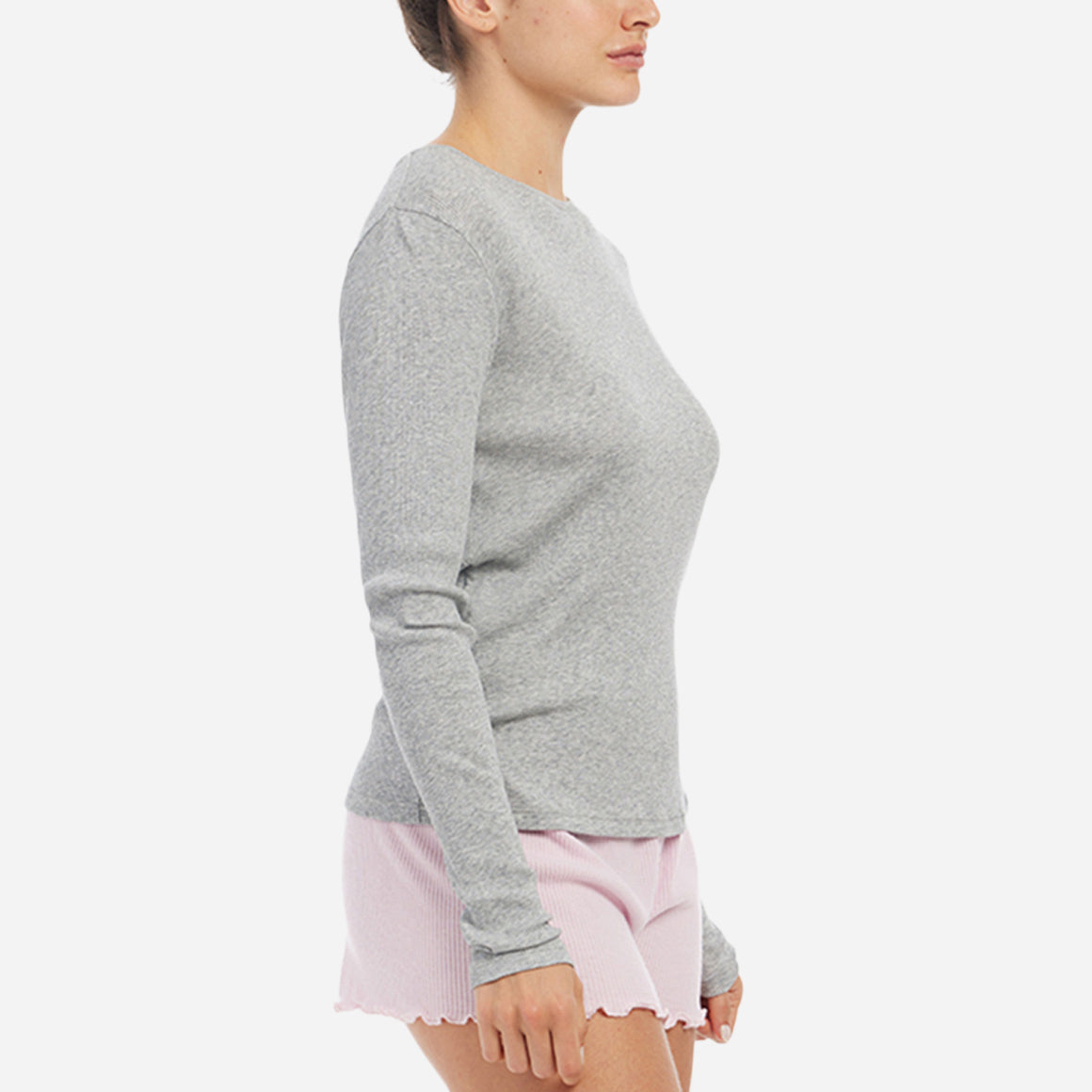 The breathable fabric ensures optimal airflow, keeping you cool and comfortable throughout the night or during cozy mornings at home. The Rayne ribbed long sleeve tee has a slim fit that features cozy details like a flattering scoop neckline, relaxed arm holes, and slightly dropped shoulders.