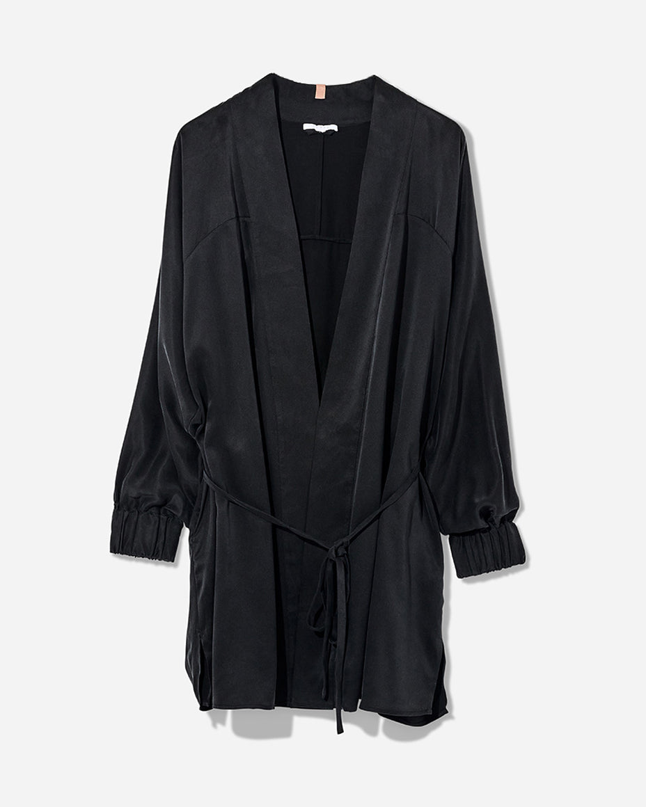 The Washable Silk Robe features a relaxed fit with a waist belt and pockets for added convenience. The lightweight and breathable fabric makes it perfect for layering over your favorite pajamas or loungewear. Machine washable.
