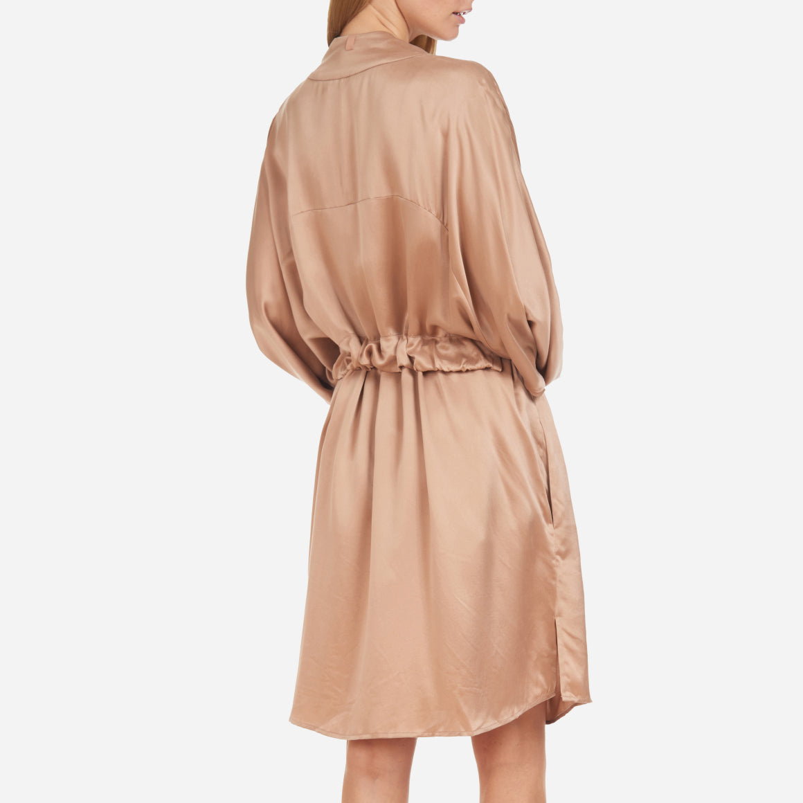 The Washable Silk Robe features a relaxed fit with a waist belt and pockets for added convenience. The lightweight and breathable fabric makes it perfect for layering over your favorite pajamas or loungewear. Machine washable.