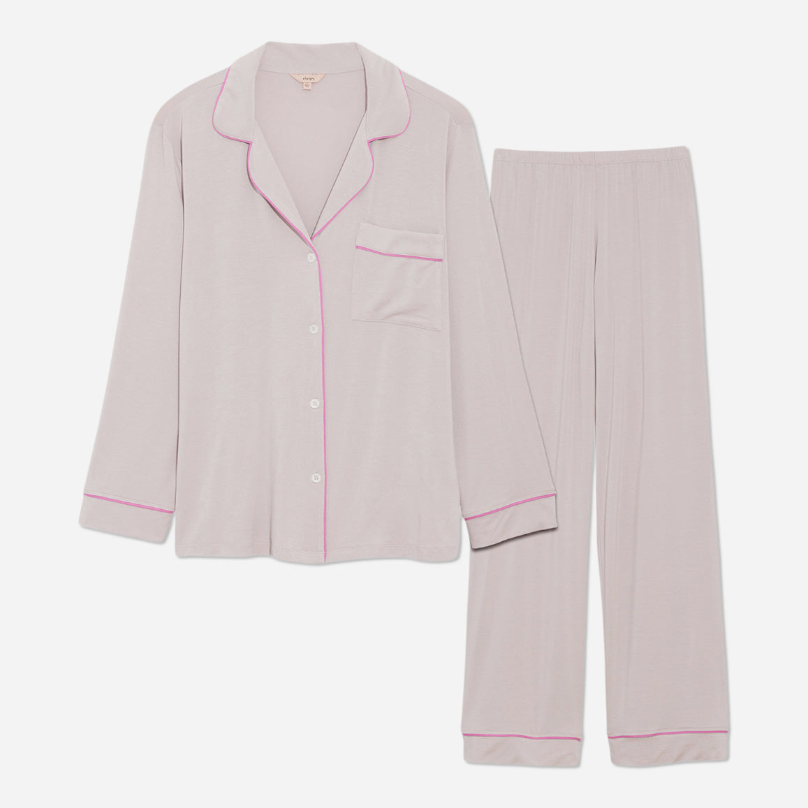 The classic yet contemporary silhouette flatters all body types, and its relaxed fit allows for unrestricted movement and maximum comfort, ensuring you wake up feeling refreshed and rejuvenated. The button-down top exudes sophistication, while the notched collar adds a touch of refinement. The matching low-rise straight leg pants offer a modern and flattering look, while the elastic waistband provides a customized fit.