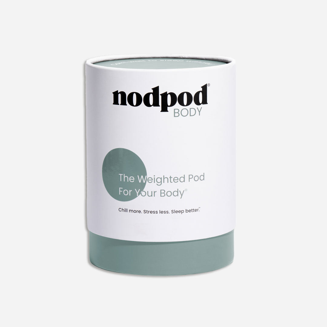 White and sage green weighted pod with 'nodpod BODY' branding on a white background