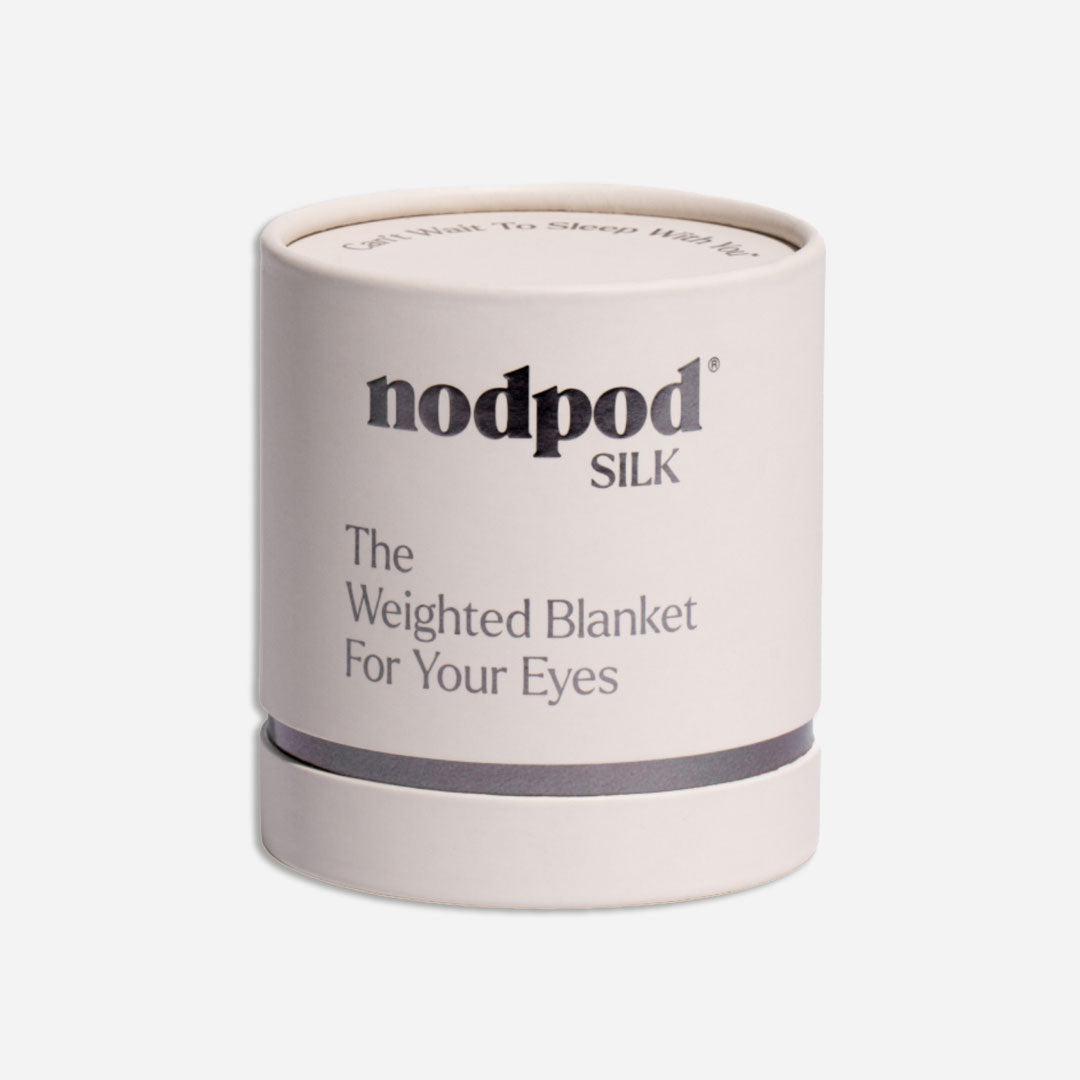 Nodpod Silk bone weighted eye mask packaging on a light grey background