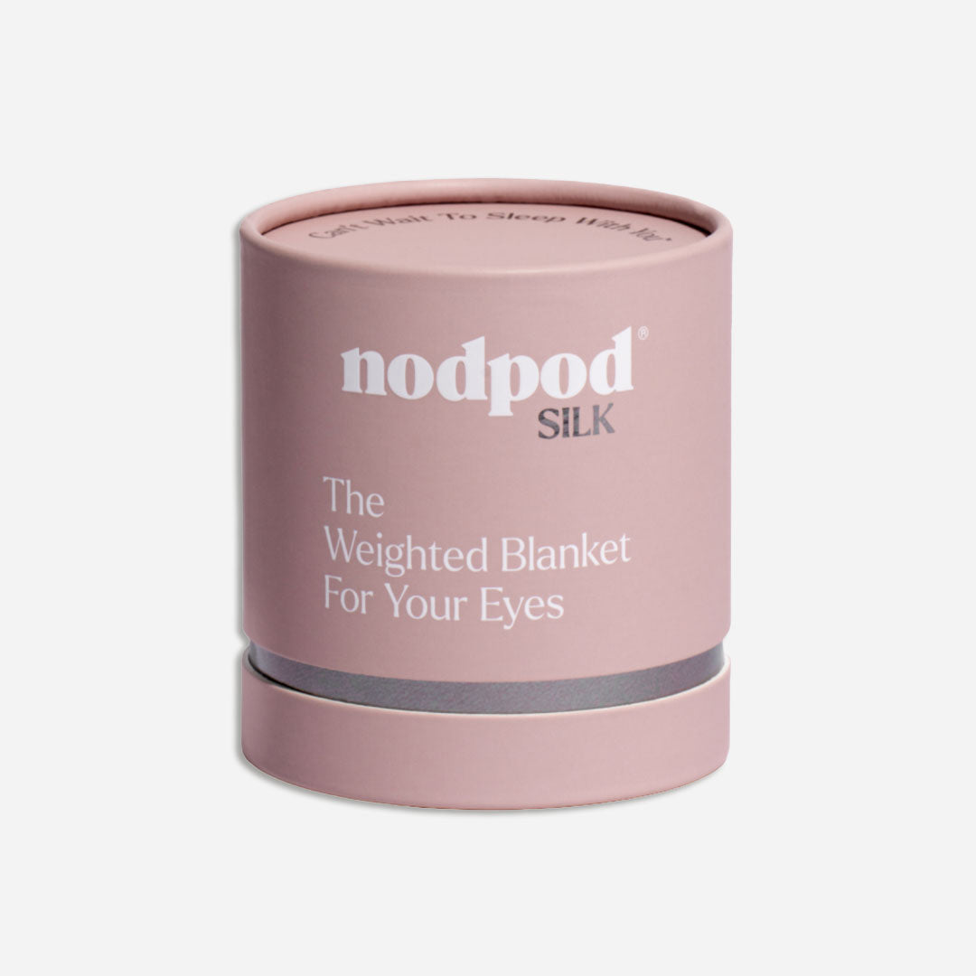 Nodpod Silk petal pink weighted eye mask packaging on a light grey background