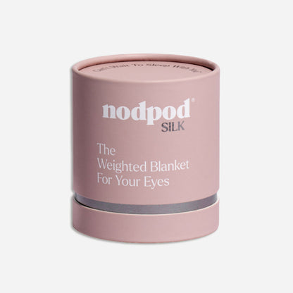 Nodpod Silk petal pink weighted eye mask packaging on a light grey background