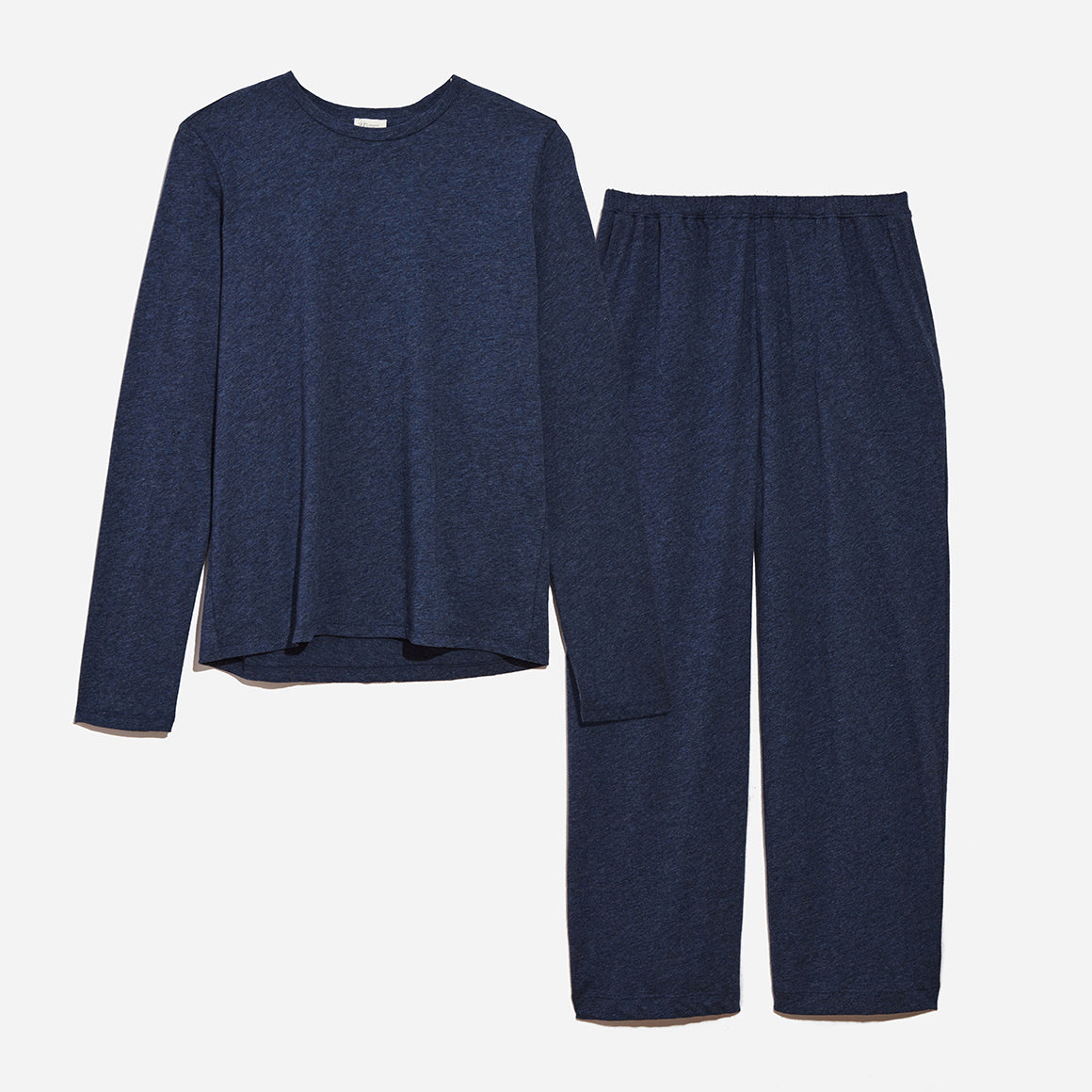 Image #1: Long sleeve crewneck top and pant loungewear set in midnight colorway. Shot against light grey background.