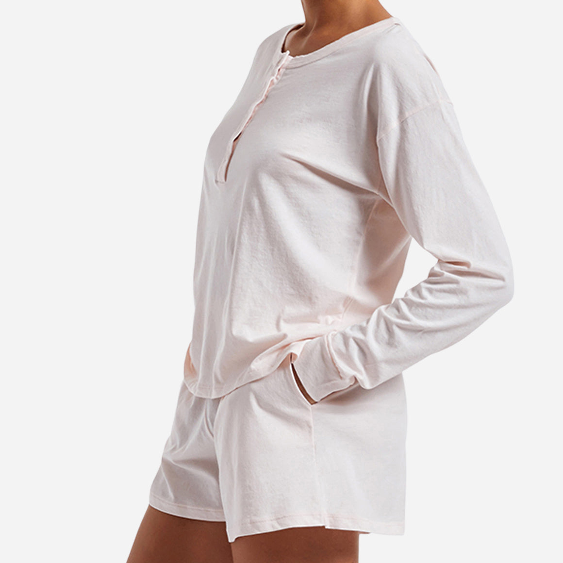 The design of the Chloe PJ Set is as elegant as it is versatile. The classic long sleeve henley shirt features a relaxed fit and a flattering neckline. The cozy shorts offer a comfortable, yet flattering silhouette, with side seam pockets and an elastic waistband ensuring a personalized fit for all body types.