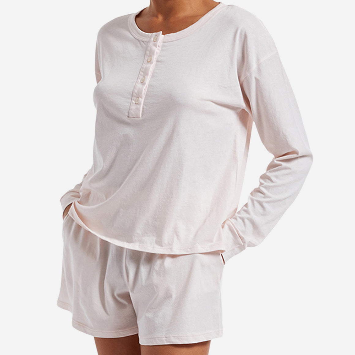 The design of the Chloe PJ Set is as elegant as it is versatile. The classic long sleeve henley shirt features a relaxed fit and a flattering neckline. The cozy shorts offer a comfortable, yet flattering silhouette, with side seam pockets and an elastic waistband ensuring a personalized fit for all body types.