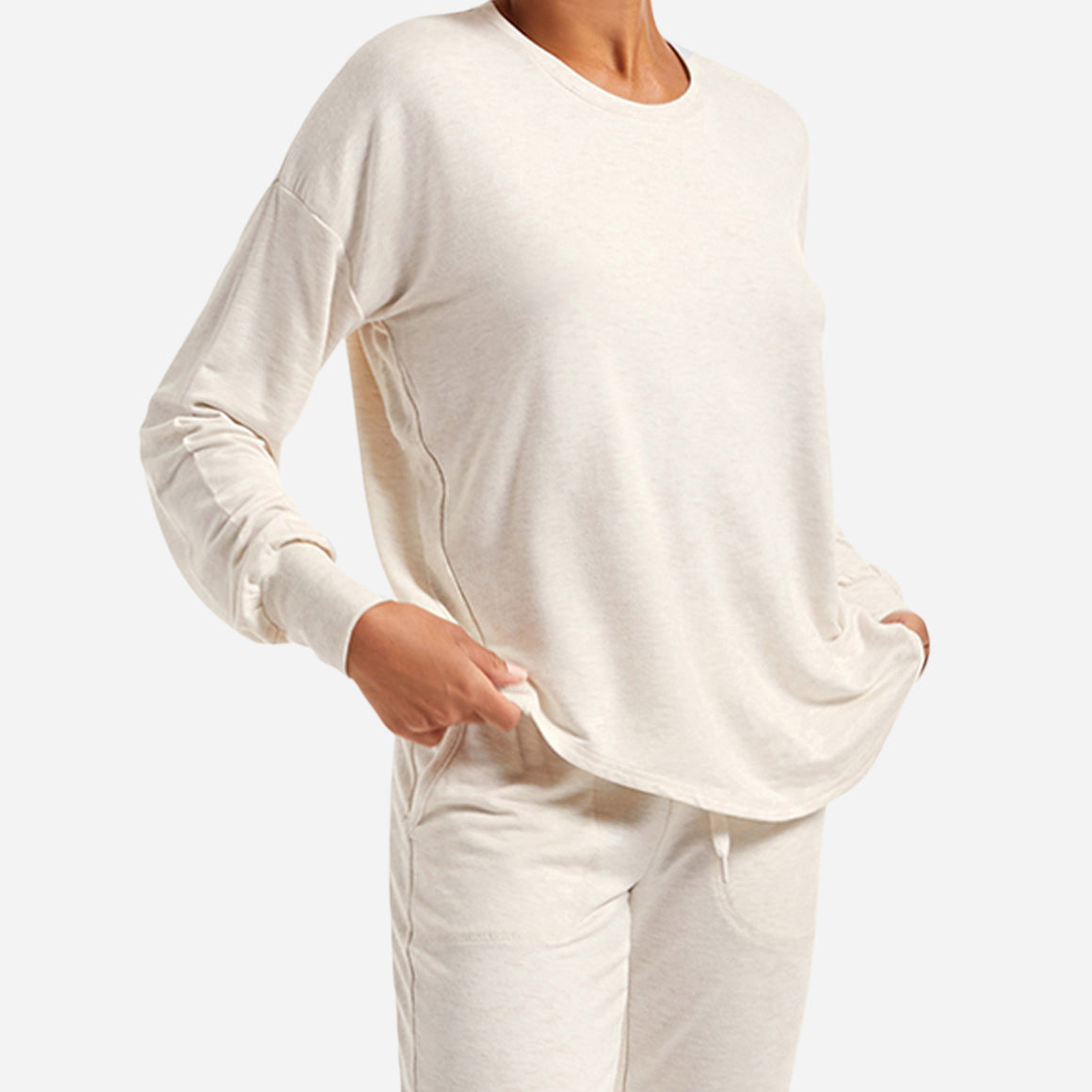 This t-shirt has a relaxed, slightly oversized fit and features a flattering crew neckline, curved hemline for extra coverage, and dropped shoulders perfect for sleep or play.