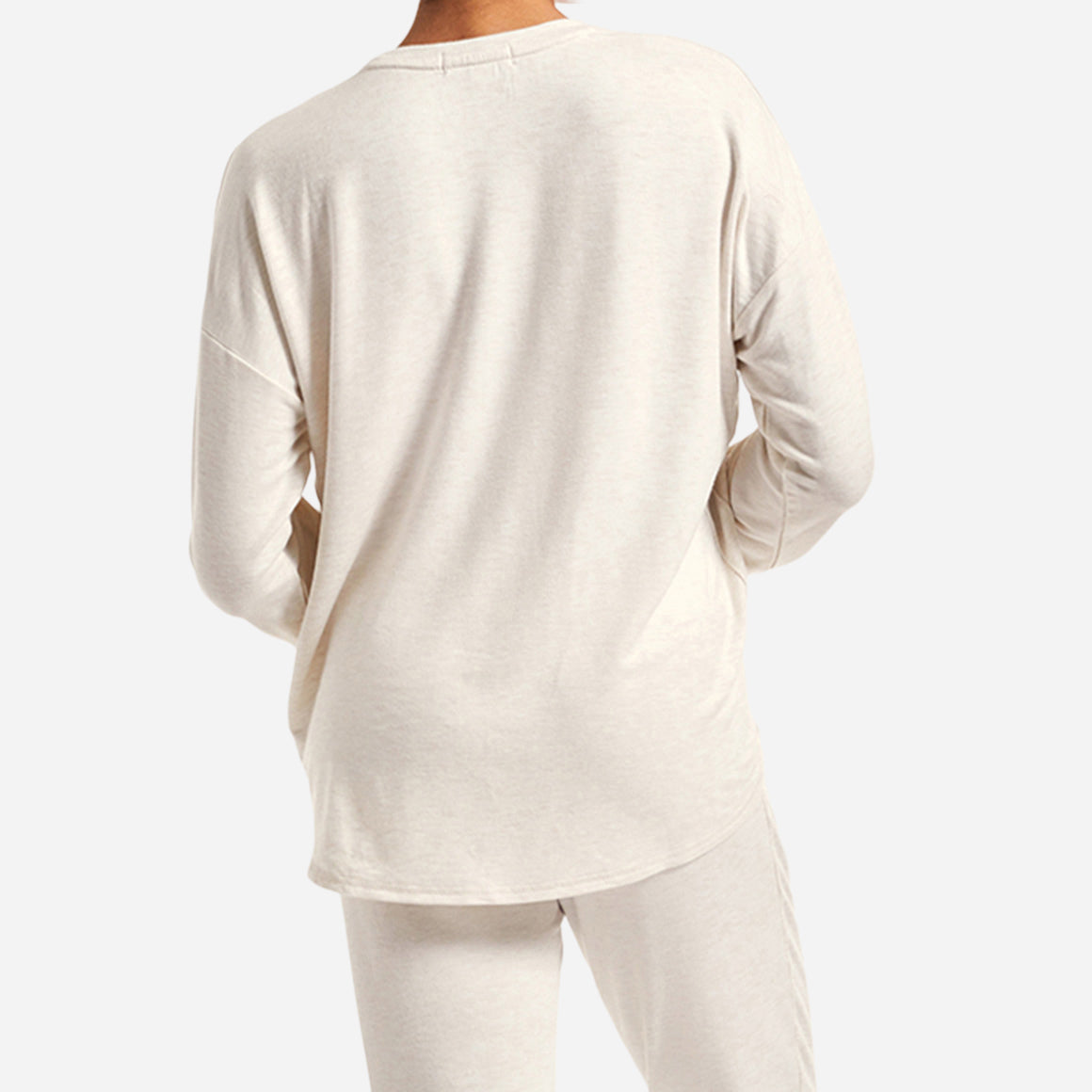 This t-shirt has a relaxed, slightly oversized fit and features a flattering crew neckline, curved hemline for extra coverage, and dropped shoulders perfect for sleep or play.