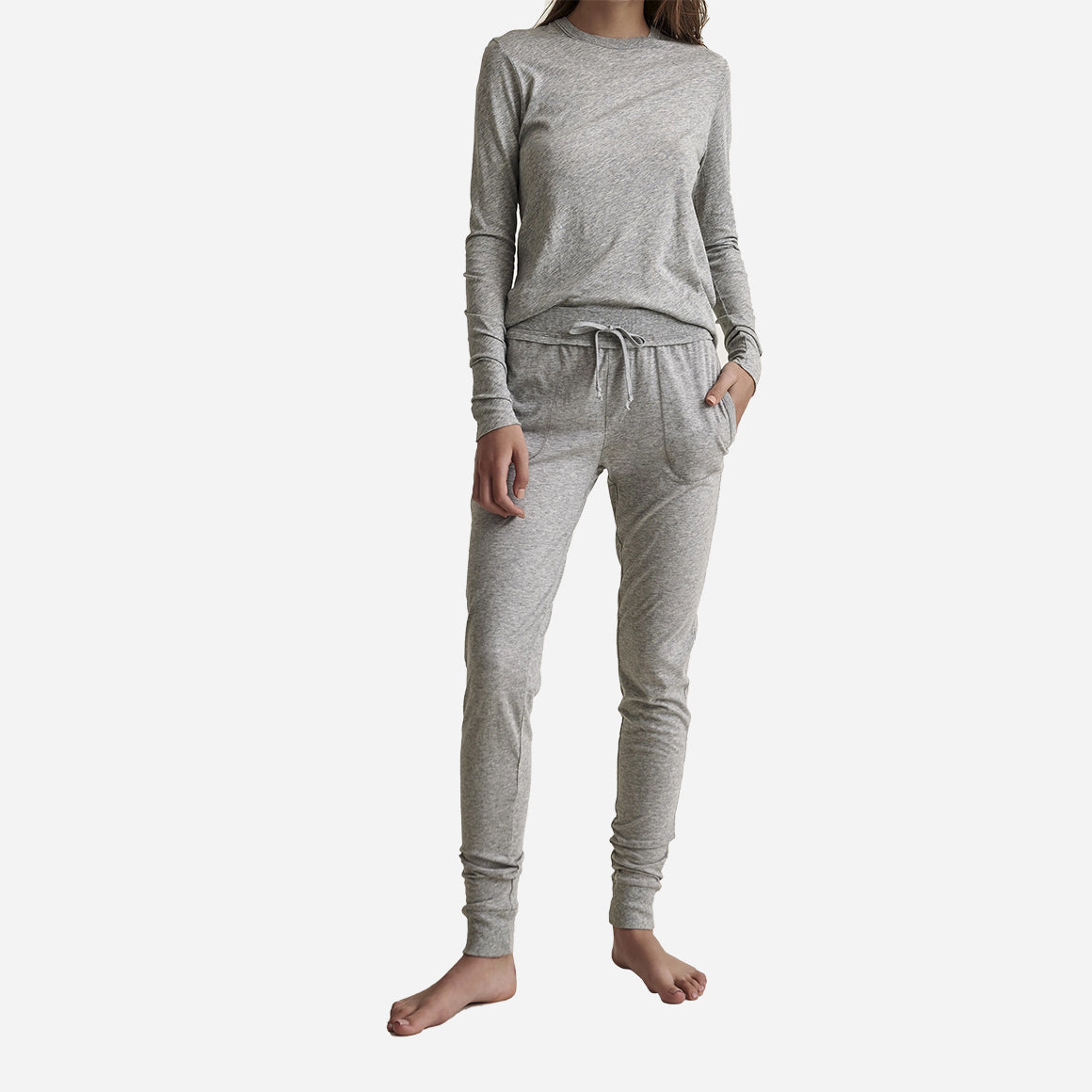 The Skinny Pant features a sleek and form-fitting design that effortlessly flatters your silhouette. Detailed with two convenient hip pockets and an elastic waistband that provides a comfortable and flexible fit. Whether you're lounging at home or running errands, these pants offer both style and comfort.