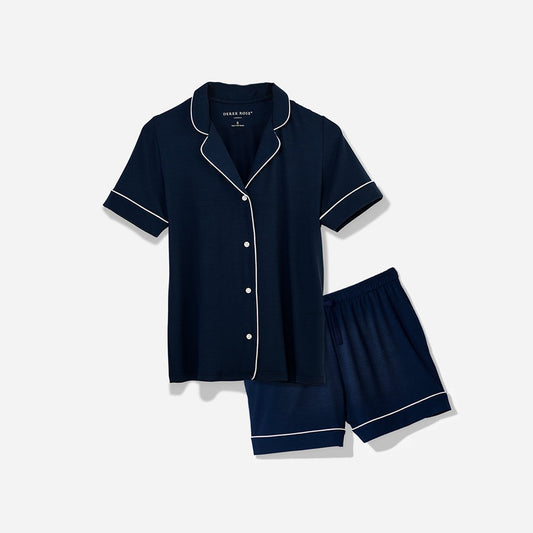 The short sleeves of this pajama set offer a breezy feel, perfect for warm summer nights or year-round comfort, while the elastic waistband on the shorts provides a custom fit. The relaxed cut allows for ease of movement, ensuring you stay comfortable and unrestricted as you unwind or go about your morning routine.