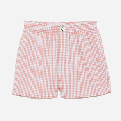 Our organic cotton boxer shorts feature a relaxed fit, button fly, and a soft elastic waistband that ensures a snug fit without being restrictive. The lightweight fabric offers breathability and comfort for a peaceful night's sleep and a stylish look that is perfect for lounging at home.