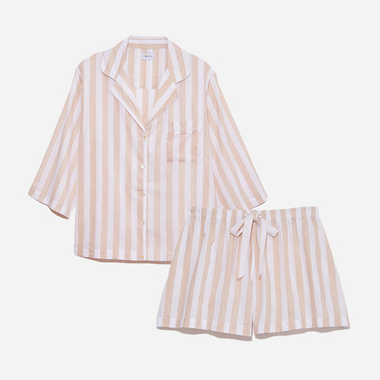 This stripe short set is made from breathable and soft GOTS-certified organic cotton voile that feels light and airy on your skin. The pajama shirt has a boxy fit for unrestricted movement and maximum comfort. The boxer-style shorts feature a comfy elastic waist for a custom fit that can be worn high on the waist or low on the hips.