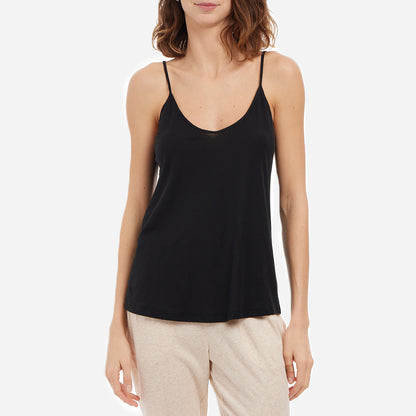 Skin’s Organic Cotton Sexy Cami provides the perfect blend of style and comfort. Made with luxuriously soft organic pima cotton, this camisole top has a blissful touch on your skin. The breathable and lightweight material ensures optimal comfort, making it perfect for bed or lounging at home. This relaxed fit cami top features delicate straps and a flattering neckline and exposed shoulder back that accentuates your natural beauty.