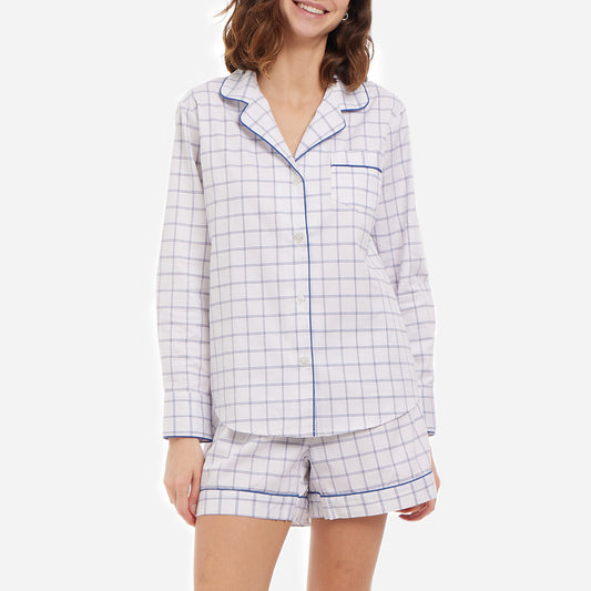 This classic tattersall check set is made from breathable and soft brushed cotton that feels light and heavenly on your skin. The pajama shirt has a relaxed cut for unrestricted movement, while the shorts feature a comfy elastic waist for a custom fit.