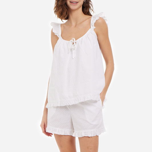 The cami top features delicate ruffled straps and a flattering neckline that accentuates your natural beauty. The accompanying shorts are designed with both style and comfort in mind, including practical side pockets. The relaxed fit allows for effortless movement, while the elastic waistband ensures a secure and personalized fit.