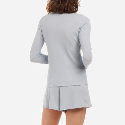The long sleeve shirt is based on Skin’s best selling, slim fit Rayne shirt, while the shorts feature the details and fit of their Regan lounge shorts. This relaxing loungewear set has a comfortable elastic waistband for a personalized fit that allows you to move freely and unrestricted.