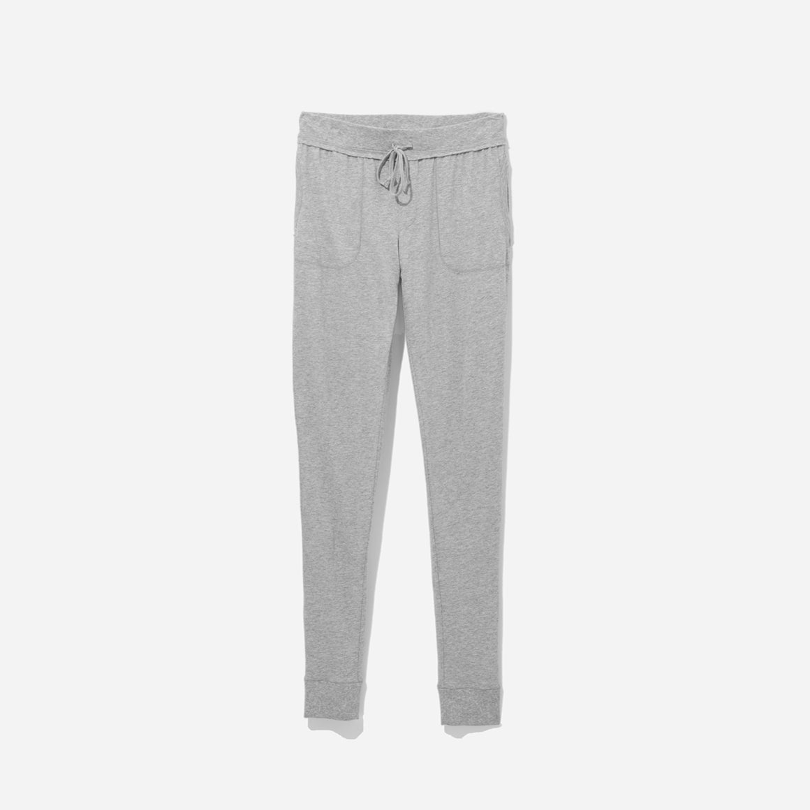The Skinny Pant features a sleek and form-fitting design that effortlessly flatters your silhouette. Detailed with two convenient hip pockets and an elastic waistband that provides a comfortable and flexible fit. Whether you're lounging at home or running errands, these pants offer both style and comfort.