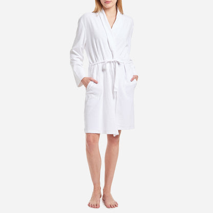 The Micro Terry Robe has a relaxed fit that falls just above the knee. It features two convenient hip pockets and a self-tie belt that allows you to adjust the fit to your preference. The breathable cotton fibers are designed to keep you cool and cozy as you unwind or go about your bedtime routine.