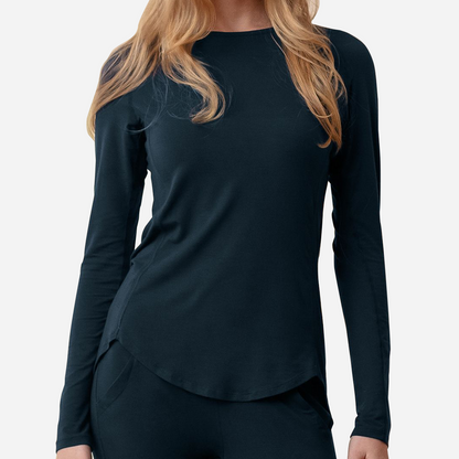 Dark blue long sleeve lounge top on female model front-facing with round neck and hem. 
