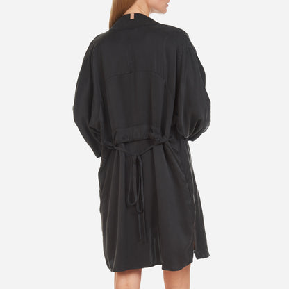 The Washable Silk Robe features a relaxed fit with a waist belt and pockets for added convenience. The lightweight and breathable fabric makes it perfect for layering over your favorite pajamas or loungewear. Machine washable.