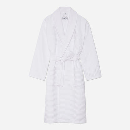This bathrobe features a relaxed fit with a detachable belt and pockets for added convenience. The cozy waffled fabric is designed to maximize the absorption of water to keep you dry and warm as you unwind or go about your morning routine.