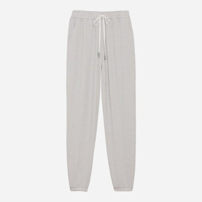These cozy jogger pants feature a relaxed fit and an elastic waistband with an adjustable drawstring to provide a customized and secure fit. Detailed with a classic yarn-dyed stripe, these stylish lounge pants are a wind-down must have.