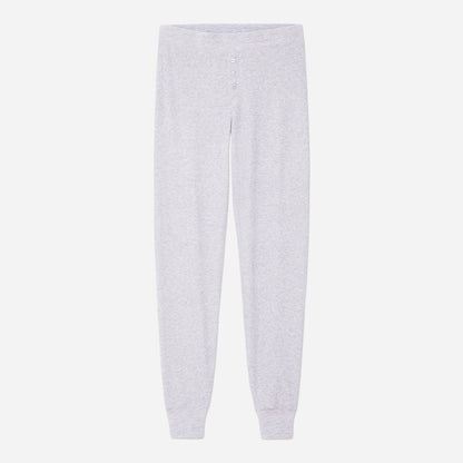These cozy joggers pants feature a cozy fit and an elastic waistband to provide a customized and secure fit. Detailed with a cute faux-button fly and ribbed ankle cuffs, these stylish lounge pants are a wind-down must have.