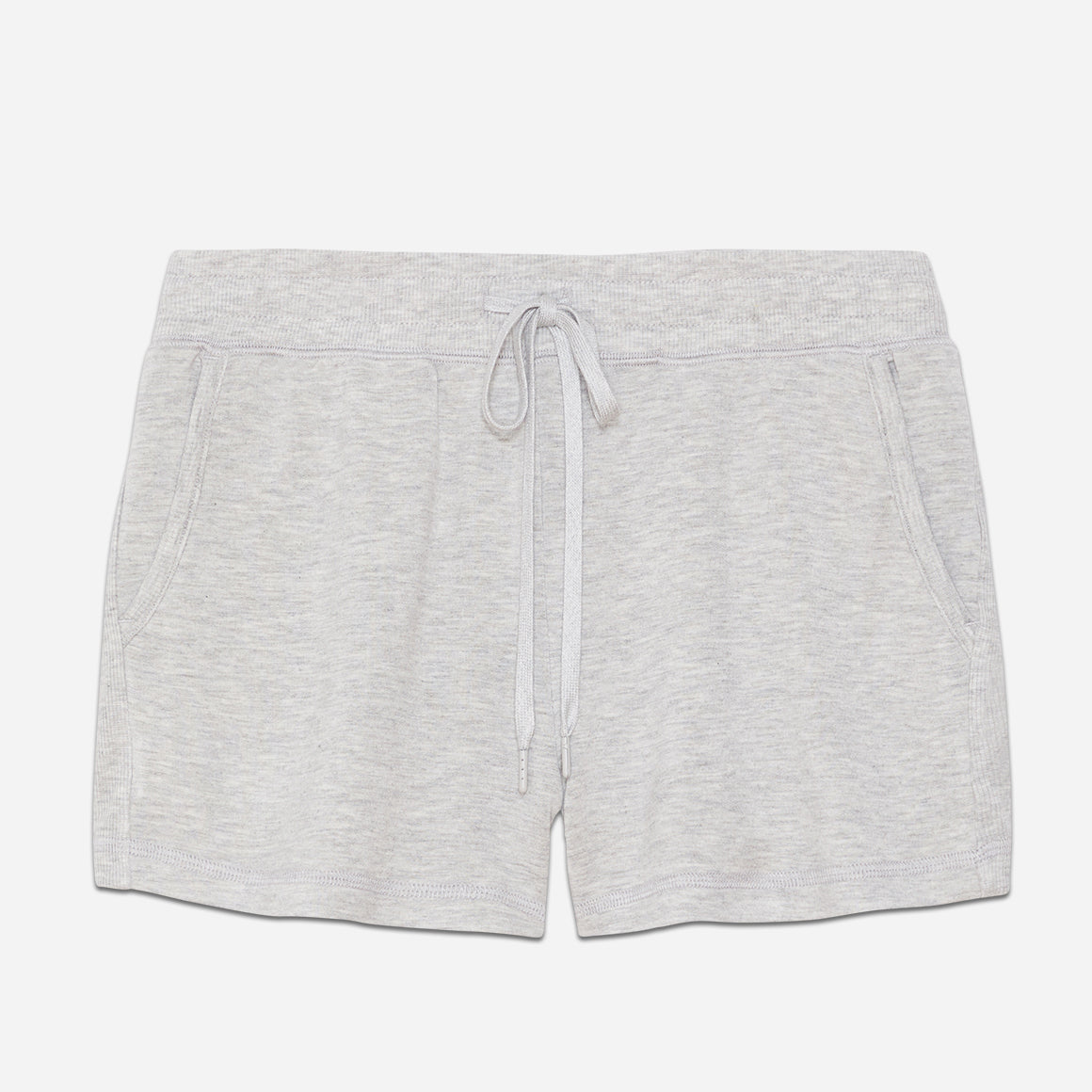 Crafted from a soft blended fabric with a touch of stretch, this lounge short offers a sumptuously soft and lightweight feel against your skin. The breathable fabric ensures optimal airflow, keeping you cool and comfortable throughout the night or during cozy mornings at home. This pj short has a cozy fit that features side seam pockets and a comfortable elastic waistband with drawstring for a personalized fit, allowing you to move freely and unrestricted.