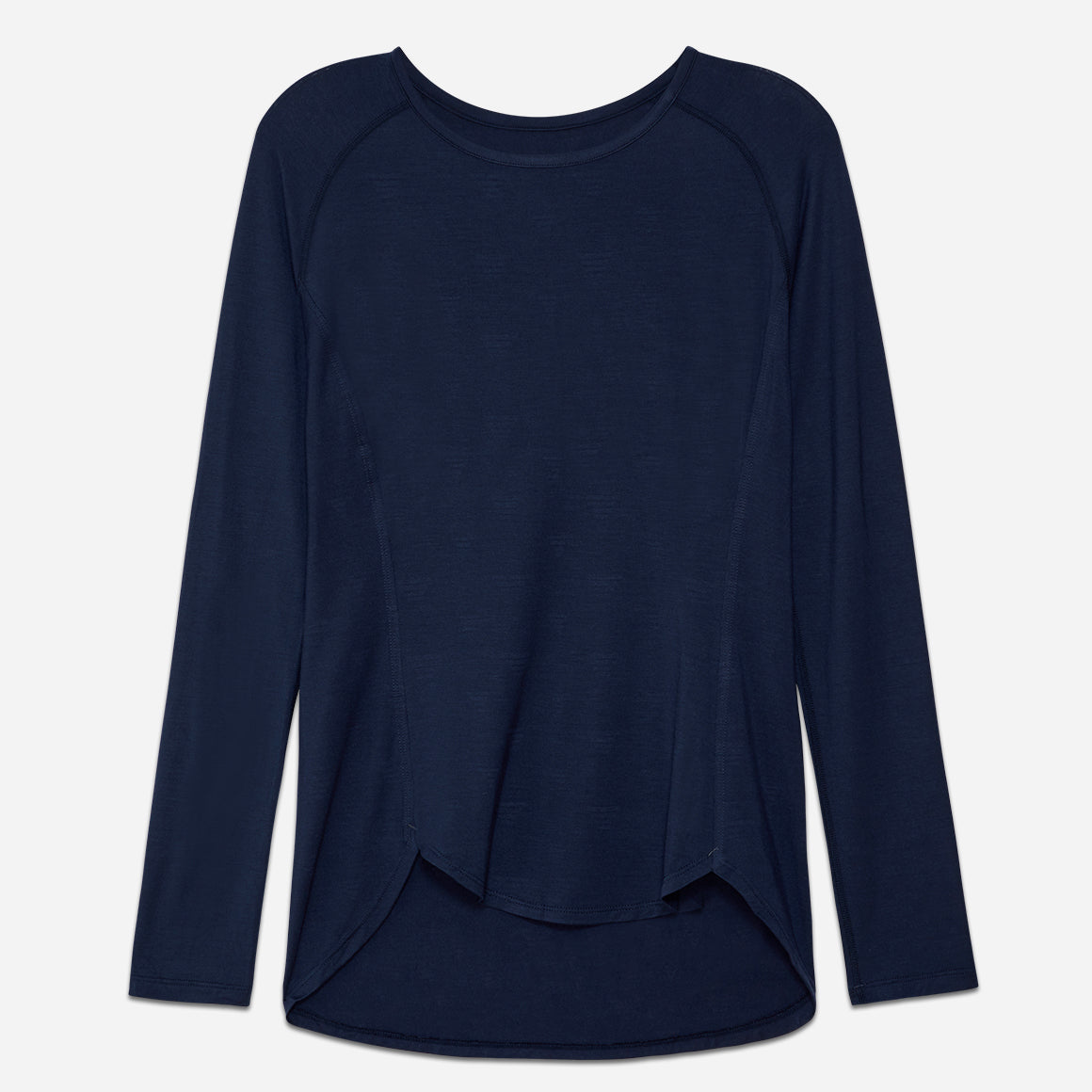Dagsmejan’s Balance Sleep Long Sleeve Top in dark blue on a  grey background with a crew neckline and rounded hem.
