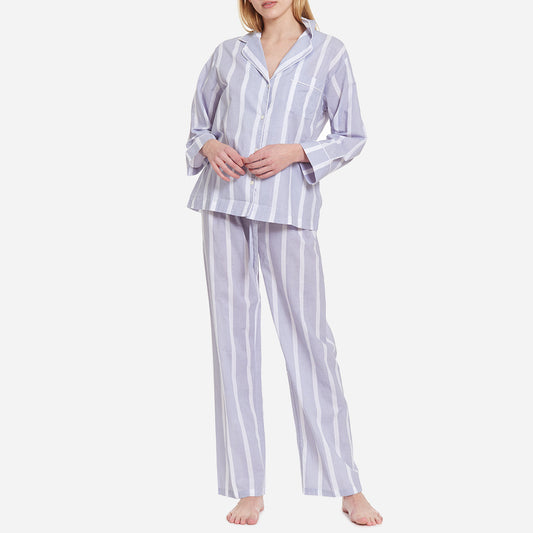 This striped set is made from breathable and soft GOTS-certified organic cotton voile that feels light and airy on your skin. The pajama shirt has a boxy fit for unrestricted movement, while the straight leg pants feature a comfy elastic waist for a custom fit that can be worn high on the waist or low on the hips.