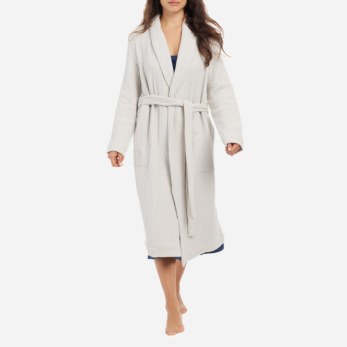 The Zoey Robe features a relaxed fit with a detachable belt and pockets for added convenience. The breathable cotton gauze fibers are designed to keep you cool and cozy as you unwind or go about your bedtime routine.