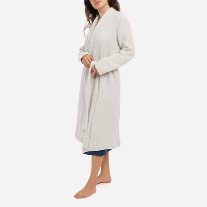The Zoey Robe features a relaxed fit with a detachable belt and pockets for added convenience. The breathable cotton gauze fibers are designed to keep you cool and cozy as you unwind or go about your bedtime routine.