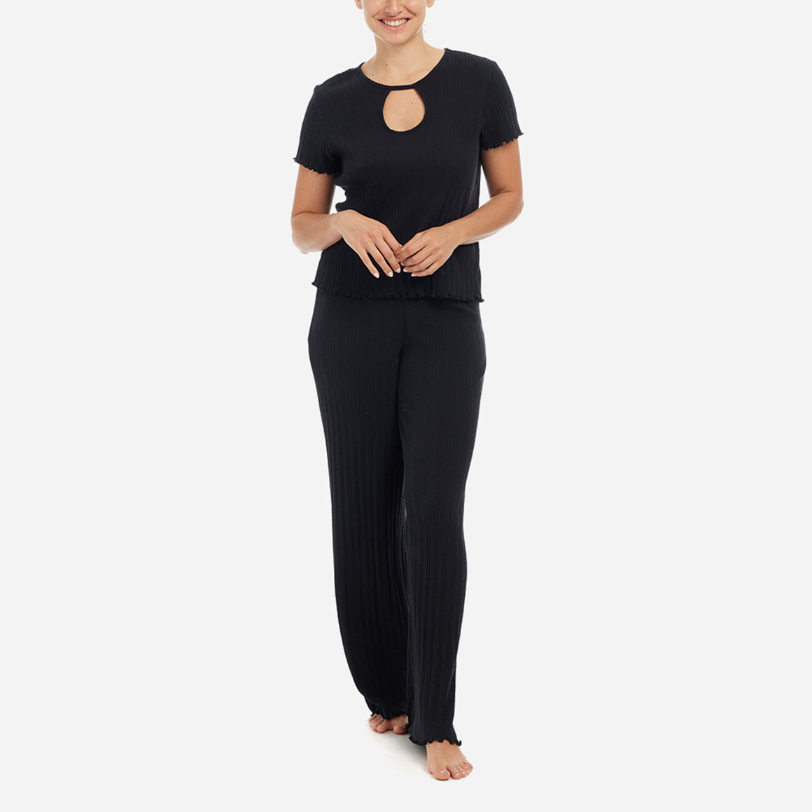 The Ravena Lounge Set has a relaxed-fit that features delicate trim details like a flattering keyhole opening and ruffled edges. The matching pants have convenient side pockets and a comfortable elastic waistband for a personalized fit, allowing you to move freely and unrestricted.